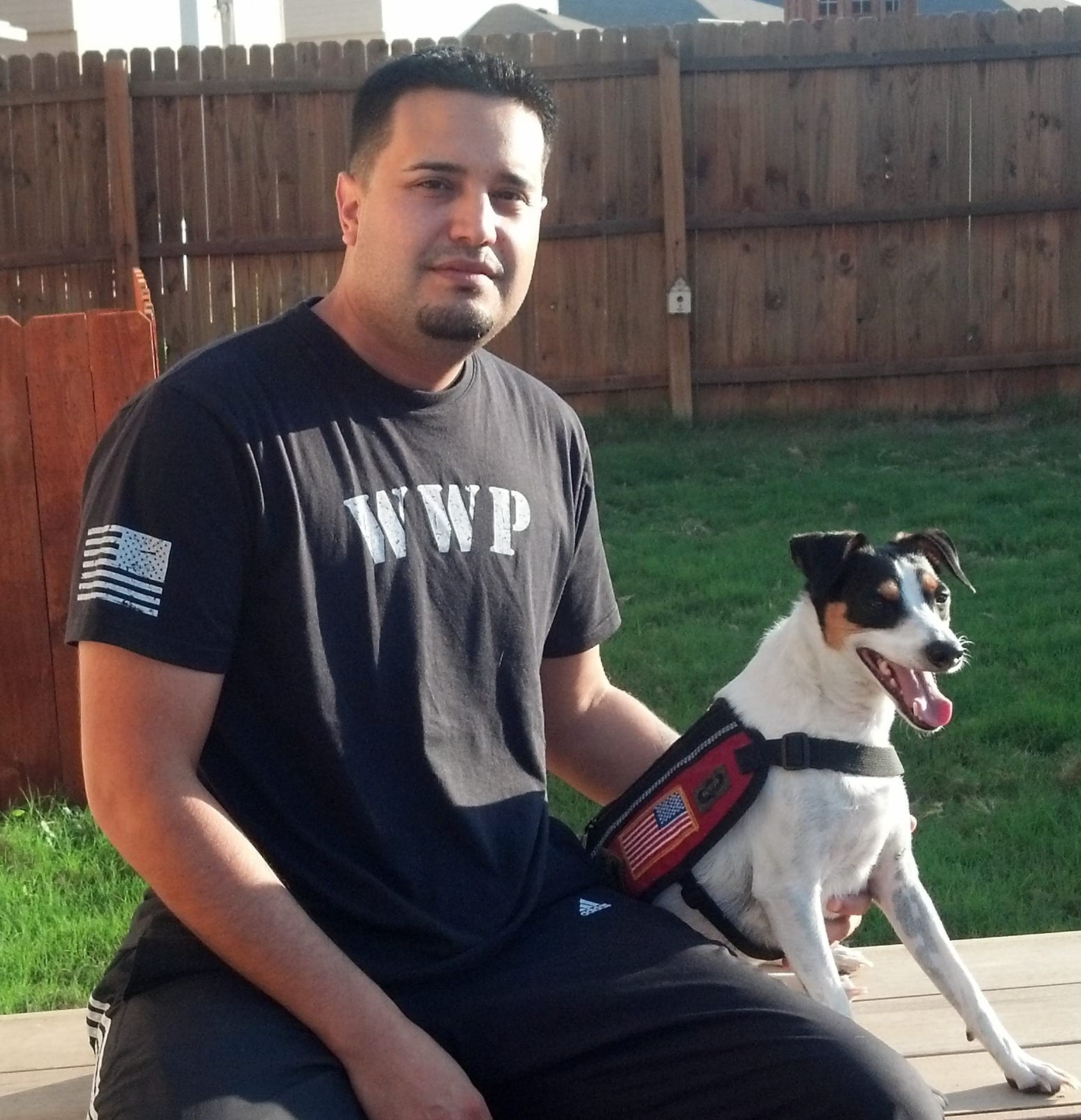 Adan Gallegos with his service animal Bootz